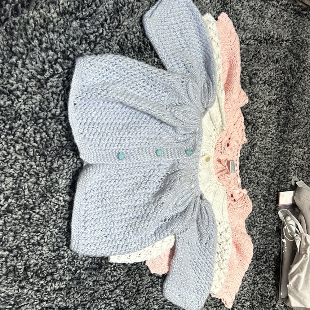Three crochet sweaters size 12 / 18 months